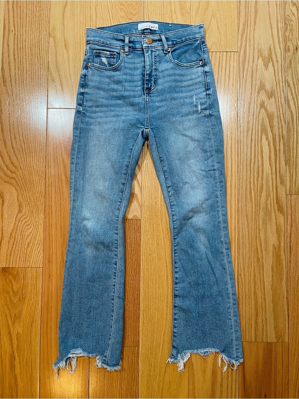 LOFT Light Blue High-Rise Flare Crop Jeans with Raw Hem